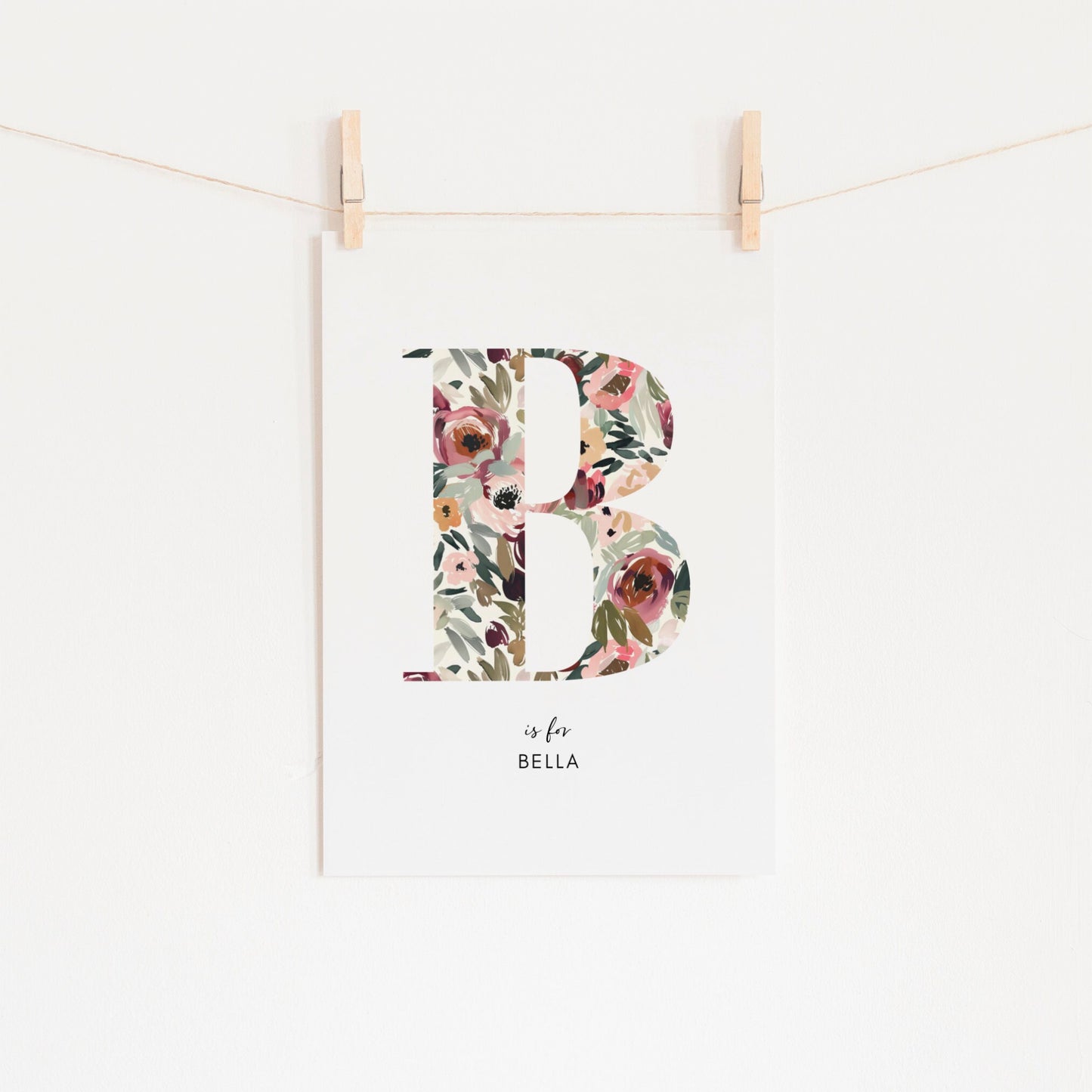 a picture hanging on a clothes line with clothes pins