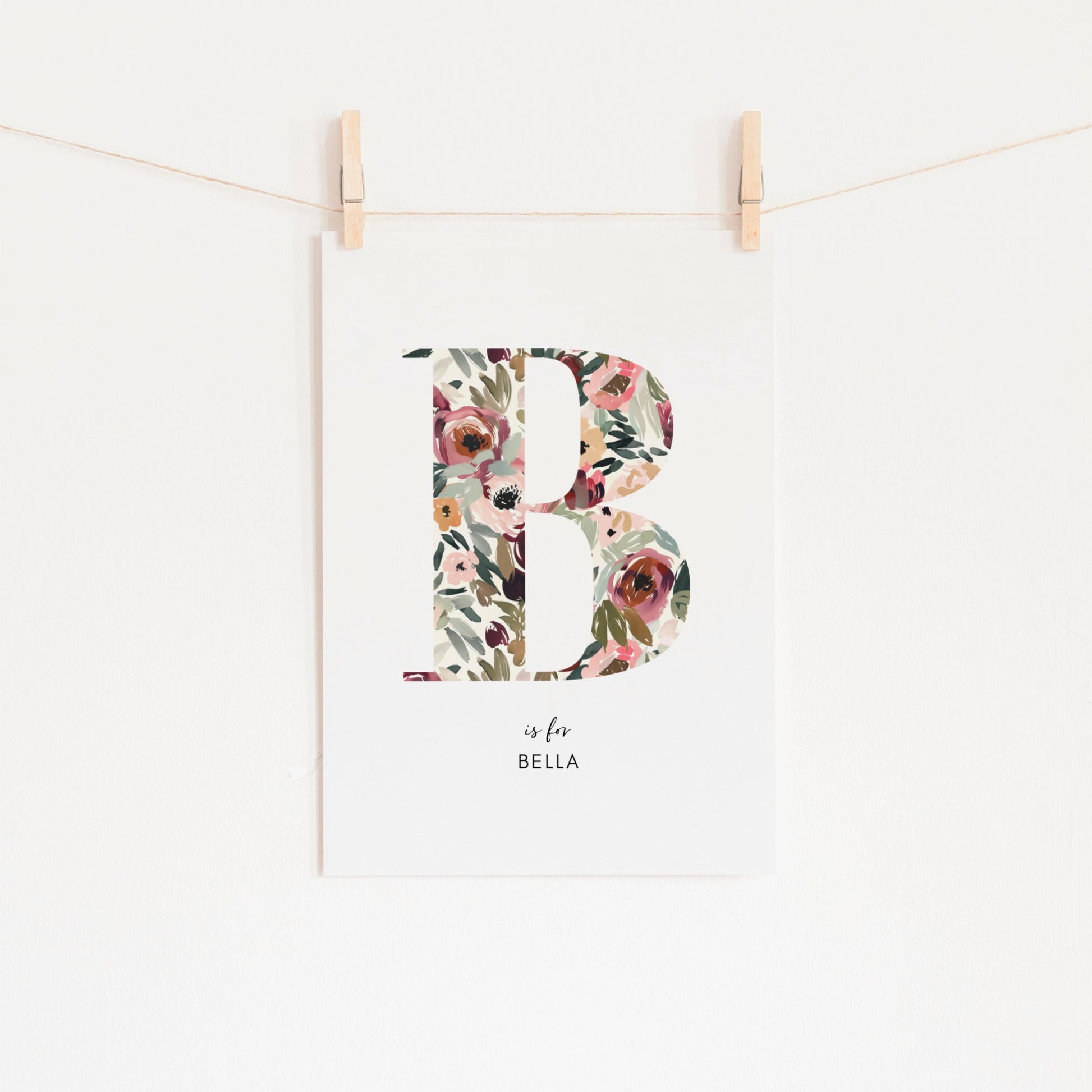 a picture hanging on a clothes line with clothes pins