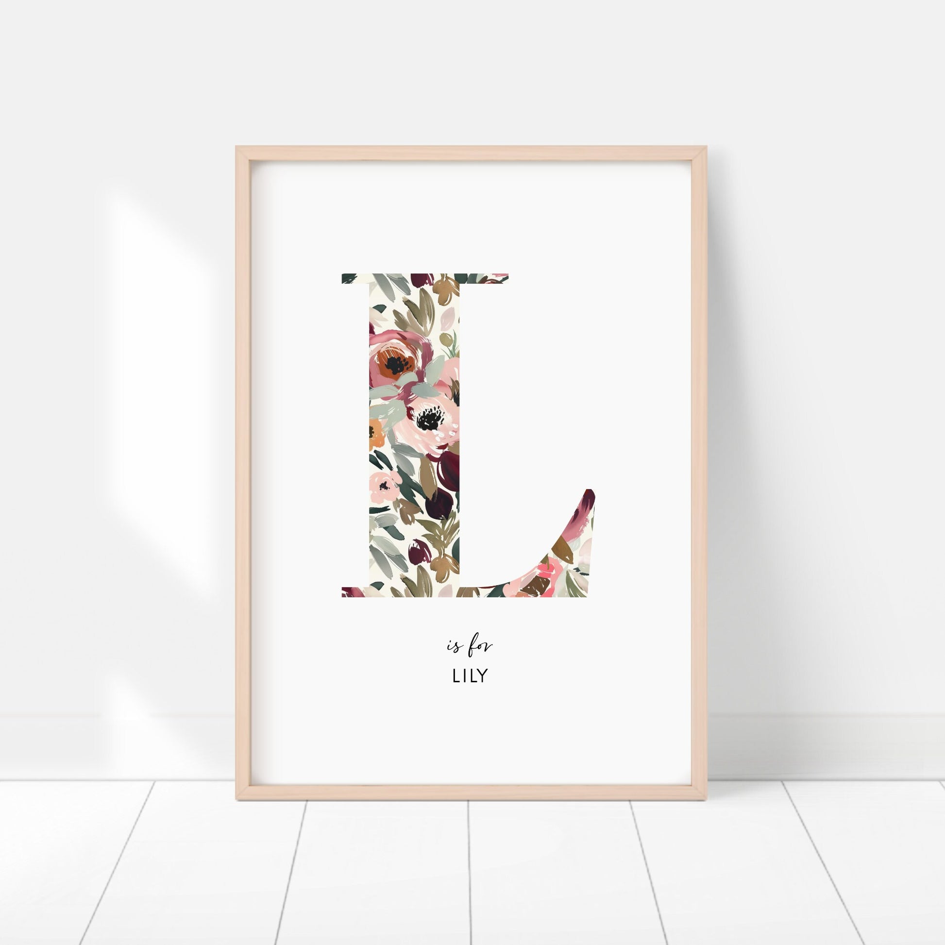 a floral print with the letter l on it